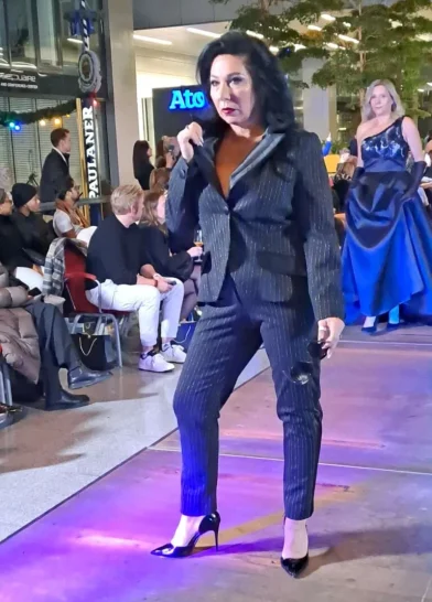 woman in dark costume