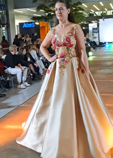 woman in golden with flowers dress